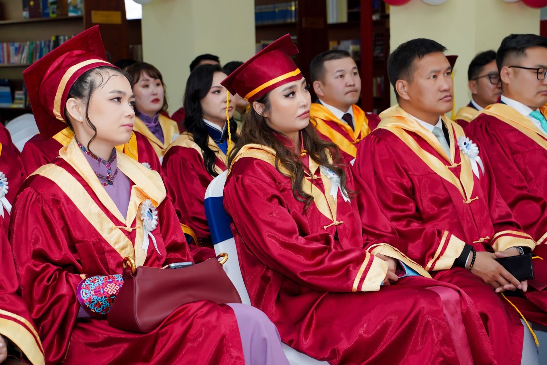 RIU graduates in the university library